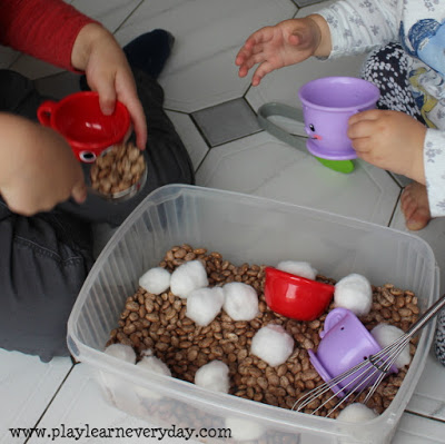 hot-chocolate-sensory-bin-scooping
